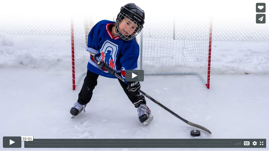 Audrey, using her specialized artificial arm to play hockey. Watch video featuring child amputees Audrey and Leah.